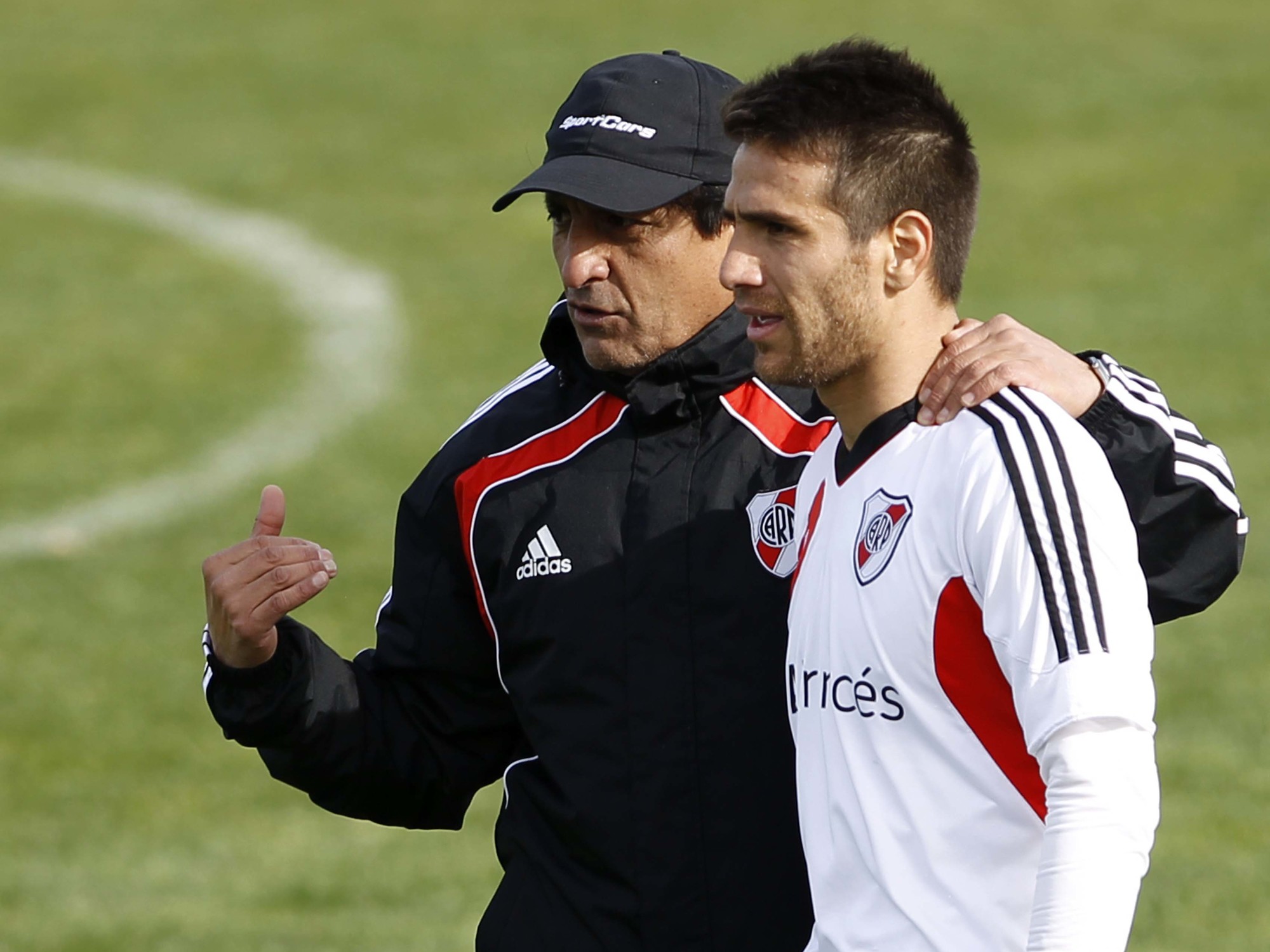 Ramón Díaz con Ponzio, en 2013